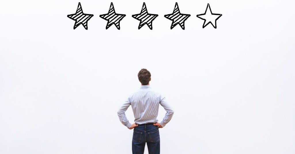 man staring at 5 star review