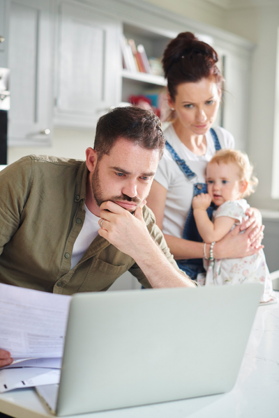 family looking at computer