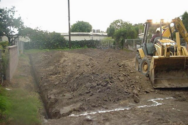 tractor grading land